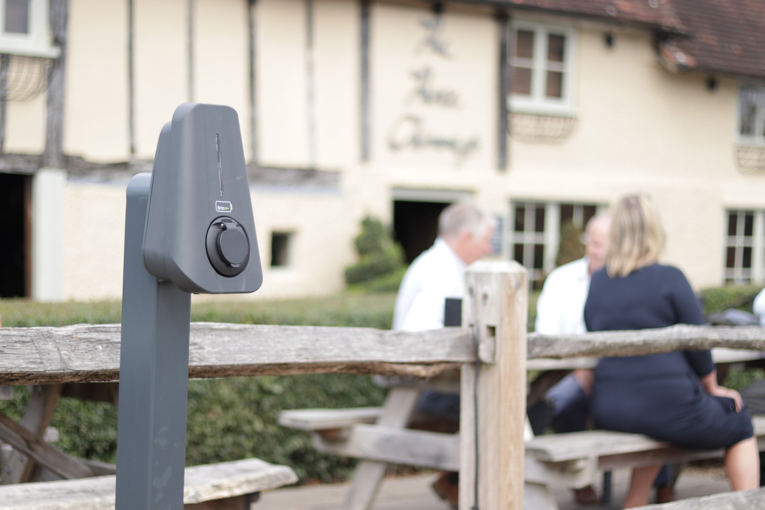 Brim community charger outside a country pub